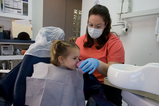 Jennifer and a young patient.